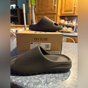 Adidas Yeezy Slide Onyx, Men’s size nine, bought off Stock X